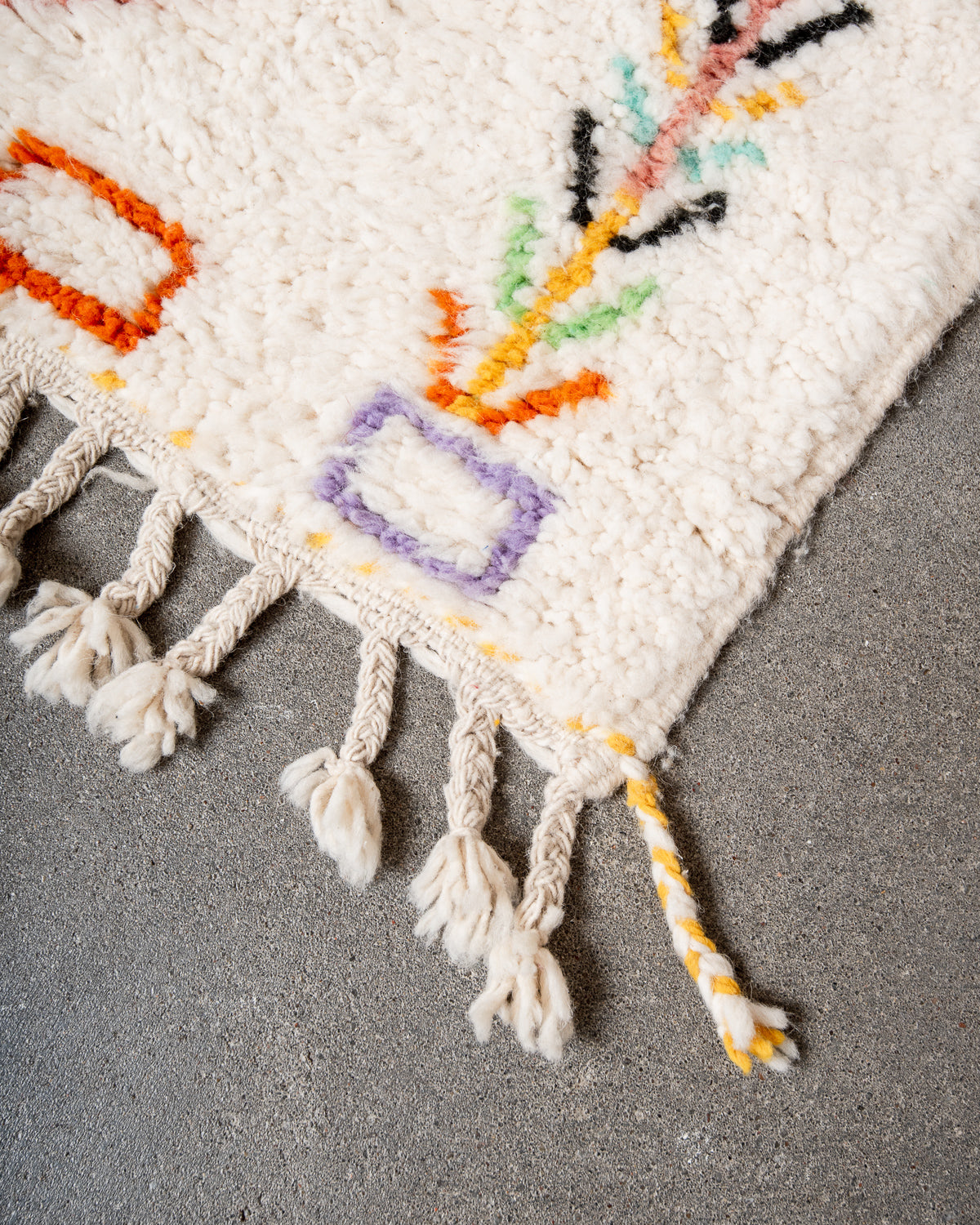 Modern, designer, handcrafted Berber rug from Morocco. Beniourain carpet with beautiful colours and patterns and fluffy wool texture.